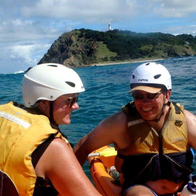 A man and a woman enjoying a kayak together.